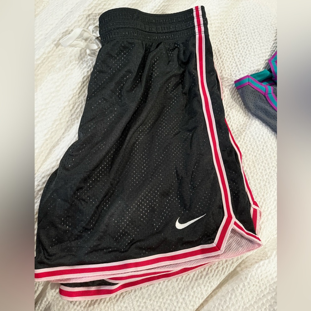 Women’s Nike Dri Fit shirts, size large, never worn
